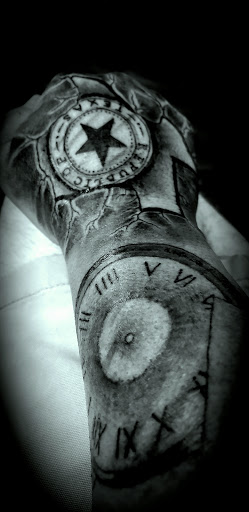 Explore upper arm tattoo ideas for women, creative tattoo ideas in Livingston, available at Voodoo Tattoo Company