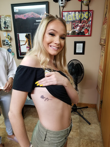 Explore cute neck tattoo ideas, creative tattoo ideas in Conway, available at Primal Urge Tattoos