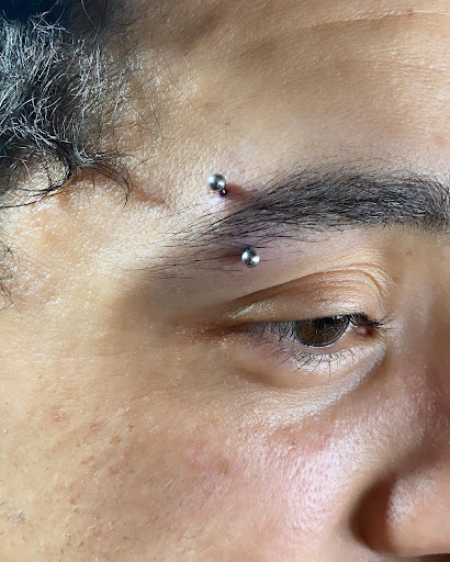 Explore wrist cross tattoo ideas, creative tattoo ideas in Corcoran, available at La Raza Tattoo 2