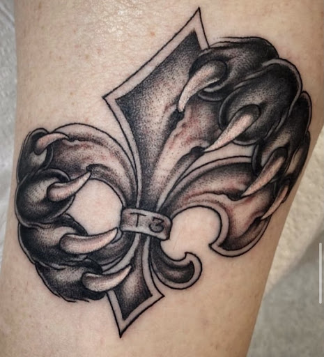 Explore minimalist tattoo ideas with meaning, creative tattoo ideas in New Orleans, available at TOUGH LOVE TATTOOS