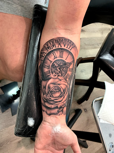 Explore chicano neck tattoo ideas, creative tattoo ideas in Harrisburg, available at Capital Tattoo Company