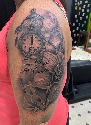Find male tattoo ideas shoulder for your next unique tattoo in Evansville at Ink Therapy 101