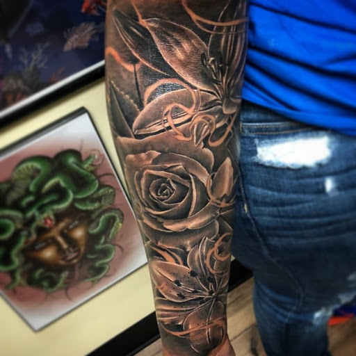 Explore name tattoo ideas for guys, creative tattoo ideas in Atlanta, available at Golden Anchor Tattoo