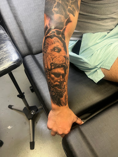 Explore tattoo ideas for 50th birthday, creative tattoo ideas in Gulfport, available at Phantom Art Studio