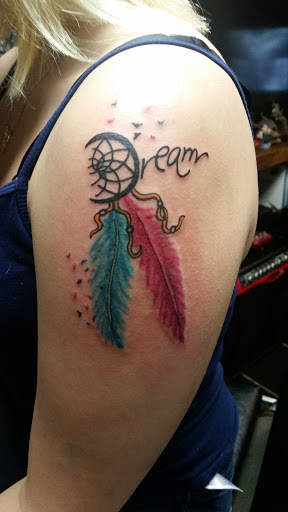 Explore sleeve tattoo ideas for women, creative tattoo ideas in Erie, available at EliKingInk