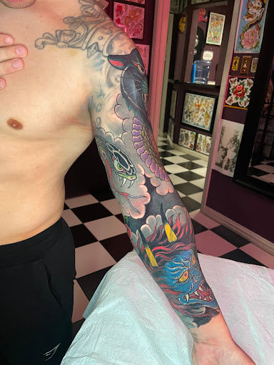 Explore rising phoenix tattoo ideas, creative tattoo ideas in Georgetown, available at Iron Rite Tattoo South