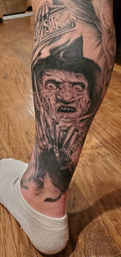 Find gemstone tattoo ideas for your next unique tattoo in Altoona at Electric Wave Tattoo