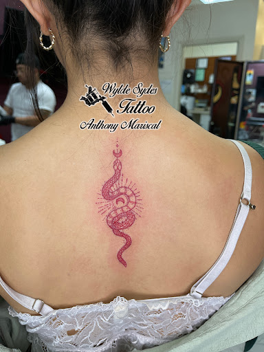 Find between the boob tattoo ideas for your next unique tattoo in San Diego at Wylde Sydes Tattoo & Body Piercing