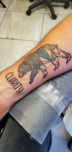 Explore wrestling tattoos ideas, creative tattoo ideas in Memphis, available at Underground Art, Inc.