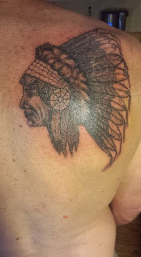 Explore shoulder tribal tattoo ideas, creative tattoo ideas in Bowman, available at iTat Tattoo Studio