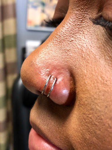 Explore blue rose tattoo ideas, creative tattoo ideas in Bay Shore, available at Piercings By Dean 95