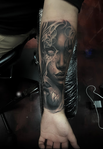 Explore purple rose tattoo ideas, creative tattoo ideas in Silver City, available at Independent Ink Tattoo
