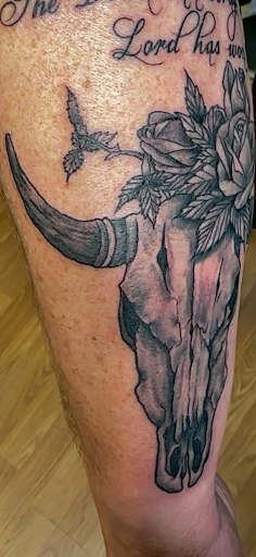 Explore ideas for spine tattoos, creative tattoo ideas in Williamsport, available at Tats Tattoo Zoo