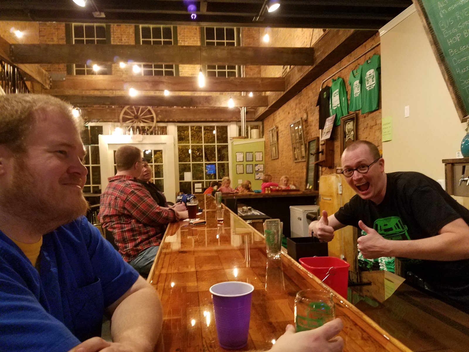 Beer taps lined up on a bar