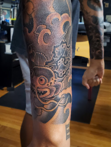 Explore ankle tattoo ideas for men, creative tattoo ideas in Pocatello, available at Tattoos by Cherise