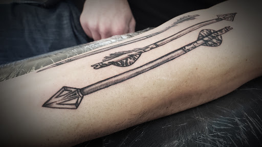 Explore purple tattoo ideas, creative tattoo ideas in Minocqua, available at Whisky Rose Tattoo Parlor