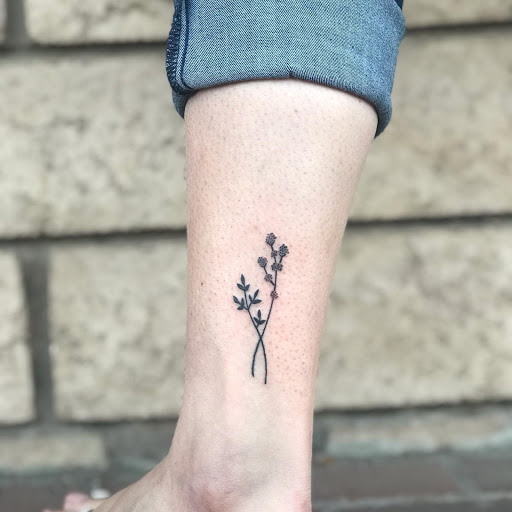 Explore floral hand tattoo ideas, creative tattoo ideas in Los Alamitos, available at Mr. Inkwells Classy Tattoos