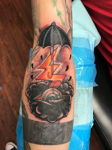 Explore push tattoo ideas, creative tattoo ideas in Seymour, available at American Gypsy Tattoo Corp.