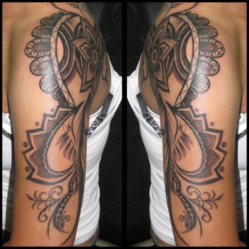 Explore motorbike tattoo ideas, creative tattoo ideas in Savannah, available at Tatlyfe Studios