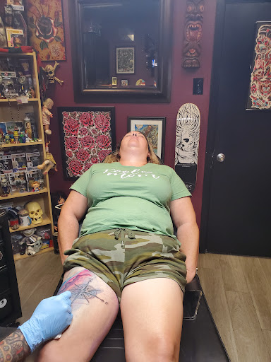Find in between boob tattoo ideas for your next unique tattoo in College Station at Legacy Tattoo Lounge