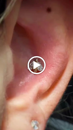 Explore tattoo ideas for behind the ear, creative tattoo ideas in Kissimmee, available at Ol Skool Tattoos Studio