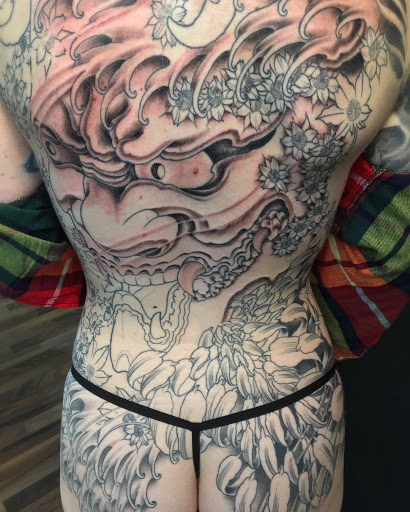 Explore tattoo cover up ideas for women, creative tattoo ideas in Peoria, available at Iron Key Tattoo Studio Inc.