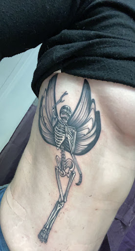 Explore banjo tattoo ideas, creative tattoo ideas in Aurora, available at The Legacy Tattoo Collective