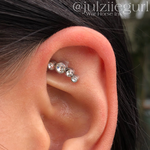 Explore minimalist tattoo ideas for men, creative tattoo ideas in Kent, available at War Horse Ink