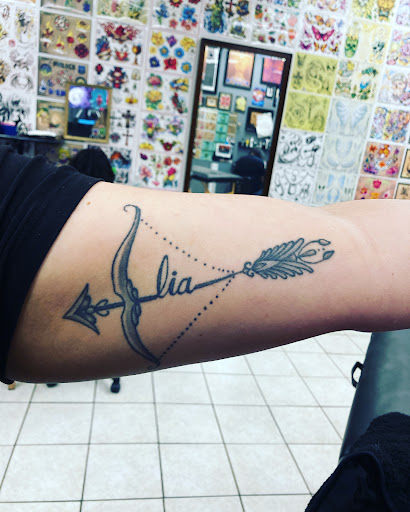 Explore silver line tattoo ideas, creative tattoo ideas in Spring, available at Late Nite Tattoos