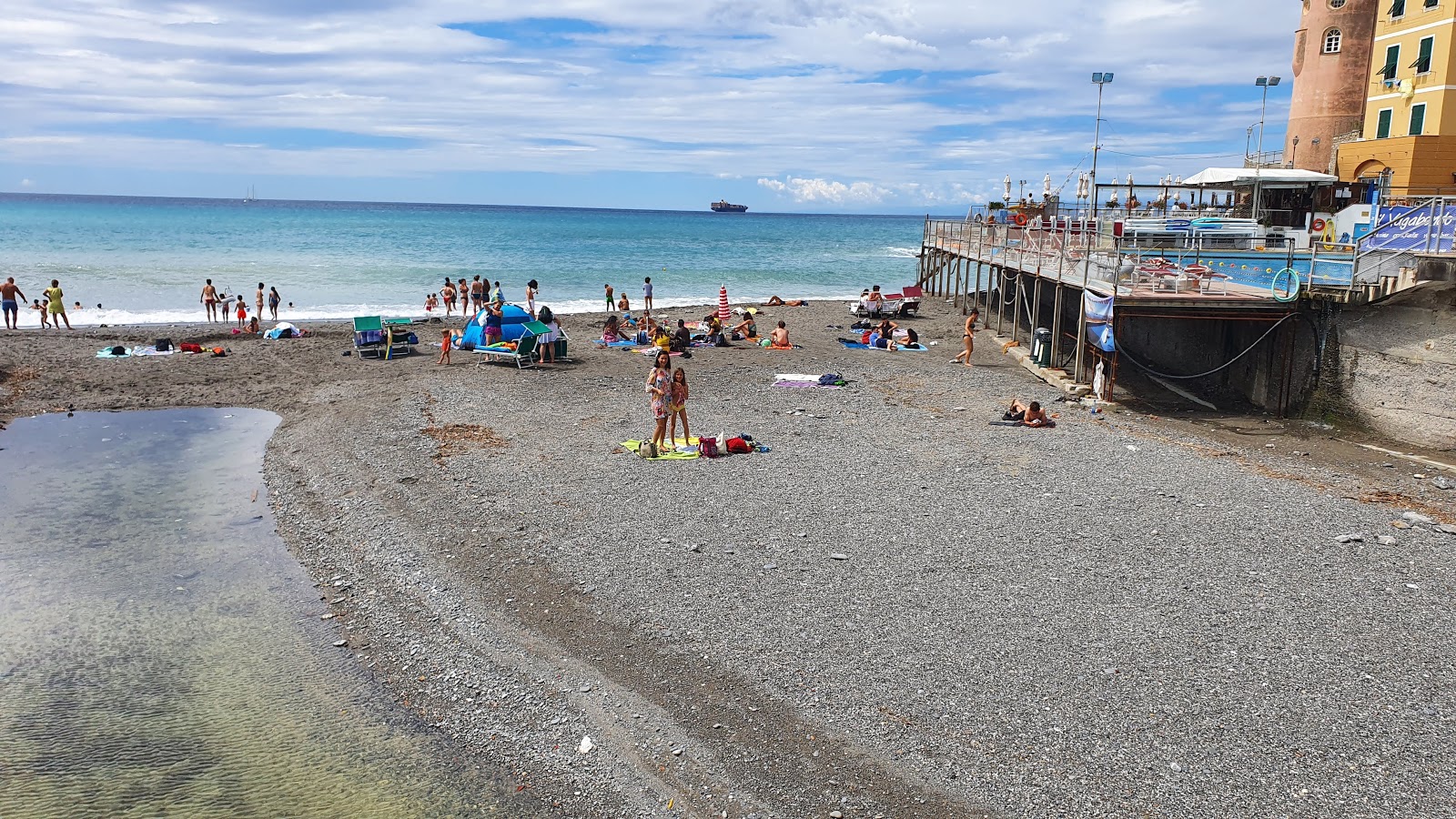 Fotografie cu Sori beach zonă de stațiune de pe plajă