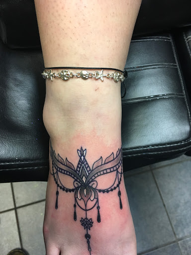 Tattoo Shop «Revolution Studios Tattoo Shop», reviews and photos, 4601 S 50th St #308, Omaha, NE 68117, USA