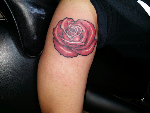 Explore green tattoo ideas, creative tattoo ideas in Foley, available at Black Sheep Custom Tattoos and Piercings