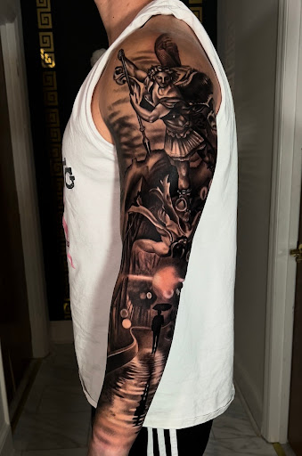 Explore female sleeve tattoos ideas, creative tattoo ideas in Matthews, available at Visual Impact Tattoo Gallery