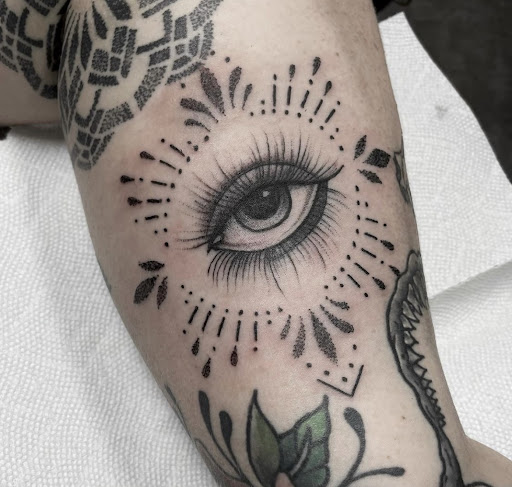 Explore cardinal tattoo ideas, creative tattoo ideas in Glenwood Springs, available at Hole In the Wall Tattoos and Piercing, LLC