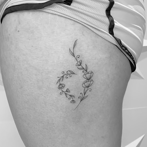 Explore november birth flower tattoo ideas, creative tattoo ideas in Fairfax, available at Pinky Inky Tattoo
