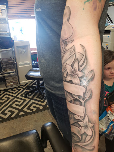 Explore mountaineering tattoo ideas, creative tattoo ideas in Omaha, available at A New Creation Tattoo