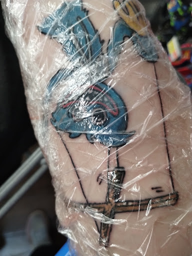 Explore good back tattoo ideas, creative tattoo ideas in Milford, available at Delaware Branding Company