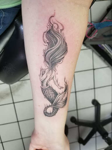 Explore jiu jitsu tattoo ideas, creative tattoo ideas in Panama City Beach, available at Oxygen Tattoo and Body Piercing Studio