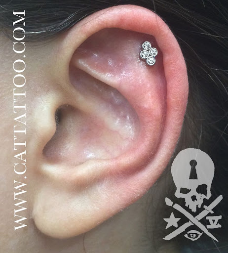 Find back tattoo ideas women for your next unique tattoo in Addison at Cat Tattoo