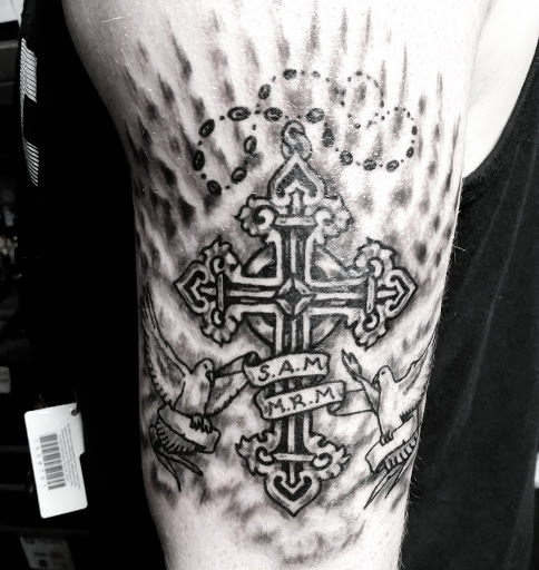 Explore back tattoo ideas for guys, creative tattoo ideas in Erie, available at EliKingInk