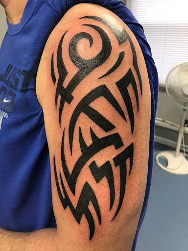 Explore tattoo ideas for ankles, creative tattoo ideas in Muncie, available at The Tattoo Studio