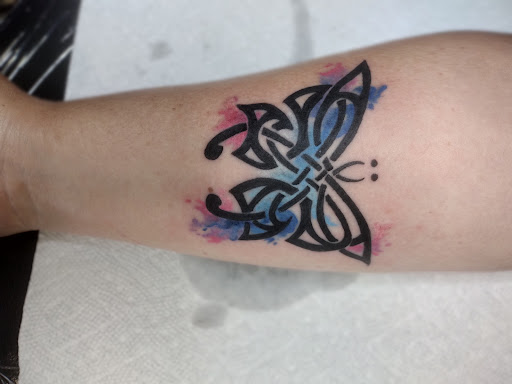 Explore deer antler tattoo ideas, creative tattoo ideas in Terre Haute, available at Birds of Valhalla Tattoos and Fine Art