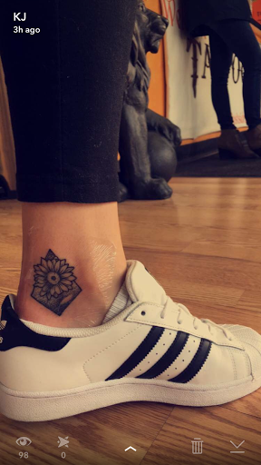 Explore caterpillar tattoo ideas, creative tattoo ideas in Farmington, available at TATTOO 13 & Laser Tattoo Removal