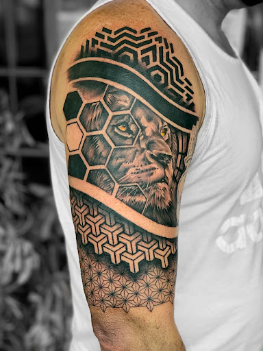 Explore thigh tattoo ideas for men, creative tattoo ideas in Amarillo, available at The Studio