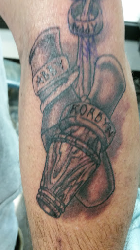 Explore bearded dragon tattoo ideas, creative tattoo ideas in Longview, available at Fugis Tattoo Shop