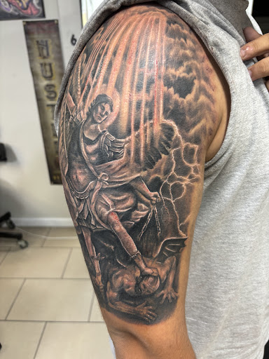 Explore blue tattoo ideas, creative tattoo ideas in Sarasota, available at SEVEN SINS Tattoo Studio