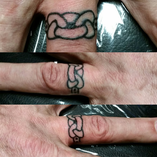 Explore tattoos on side of hand ideas, creative tattoo ideas in Erie, available at EliKingInk
