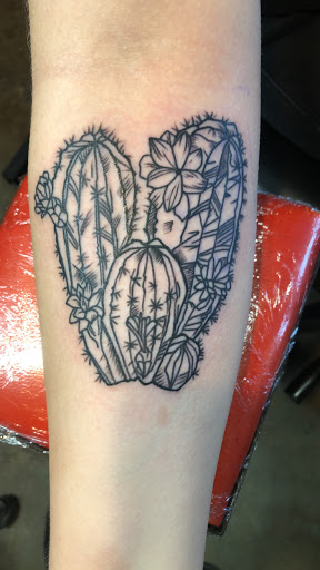 Explore tattoo ideas for father and son, creative tattoo ideas in Sioux Falls, available at Permanent Addictions