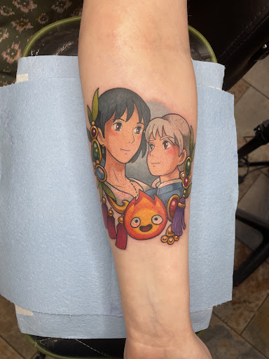 Explore bicep tattoo ideas men, creative tattoo ideas in Green Bay, available at The Blue Gem Tattooing