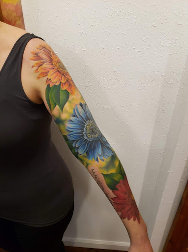 Explore upper arm tattoo ideas for women, creative tattoo ideas in Sparta, available at Black Sheep Studios